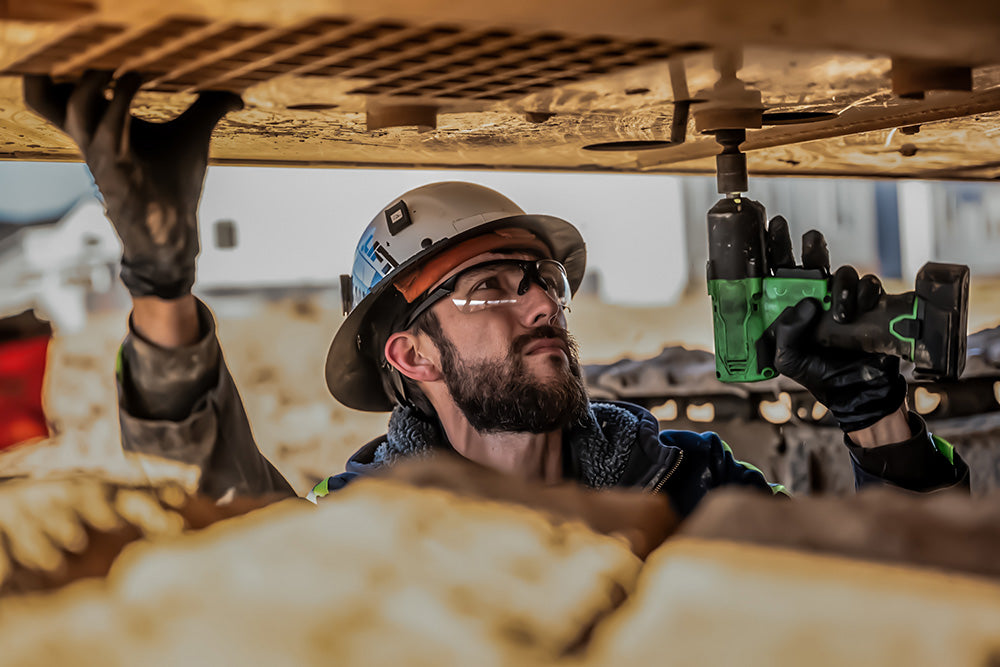 Industrial working wearing clear Wiley X protective eyewear