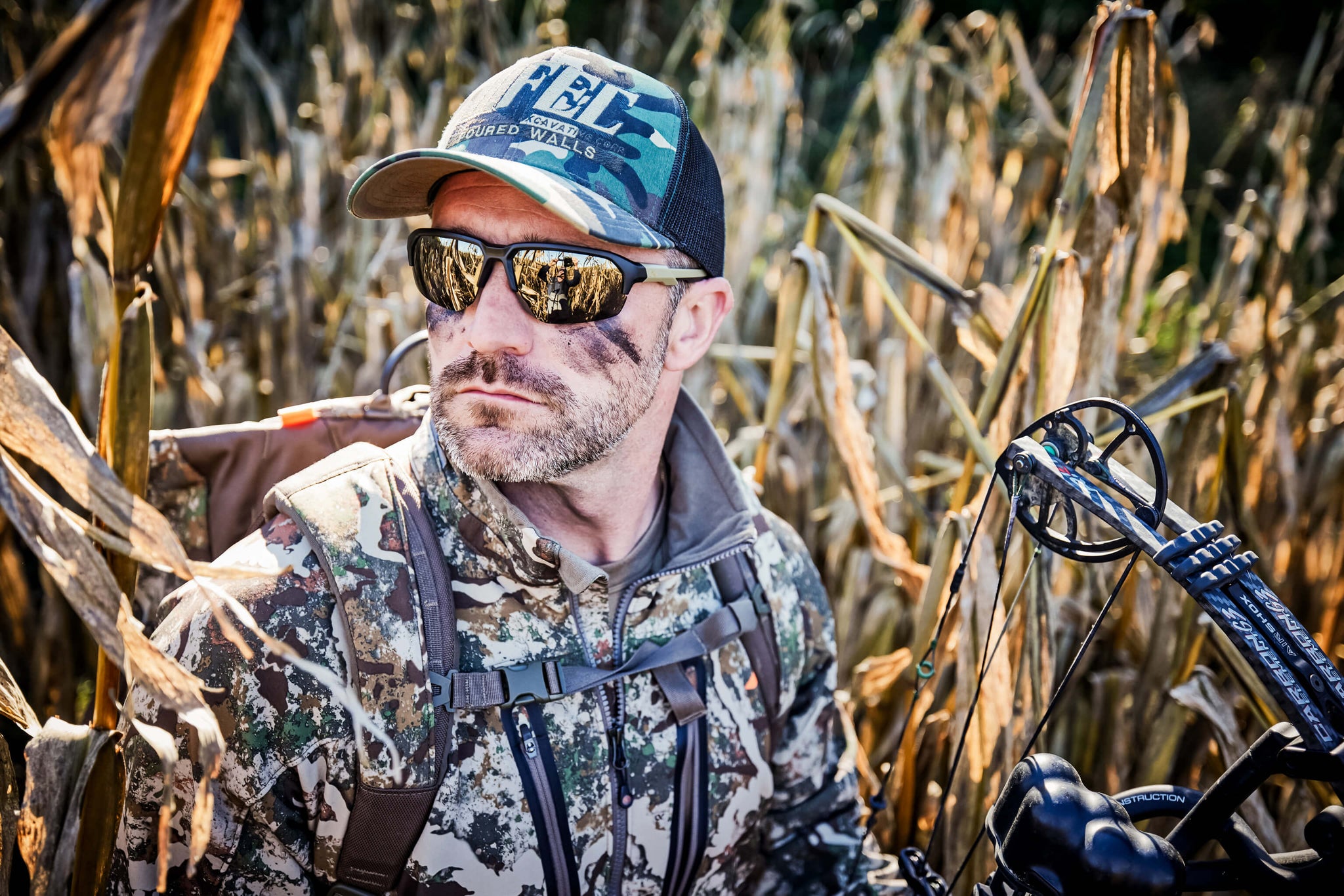 Man bow hunting with the WX Jakl Tungsten Lenses