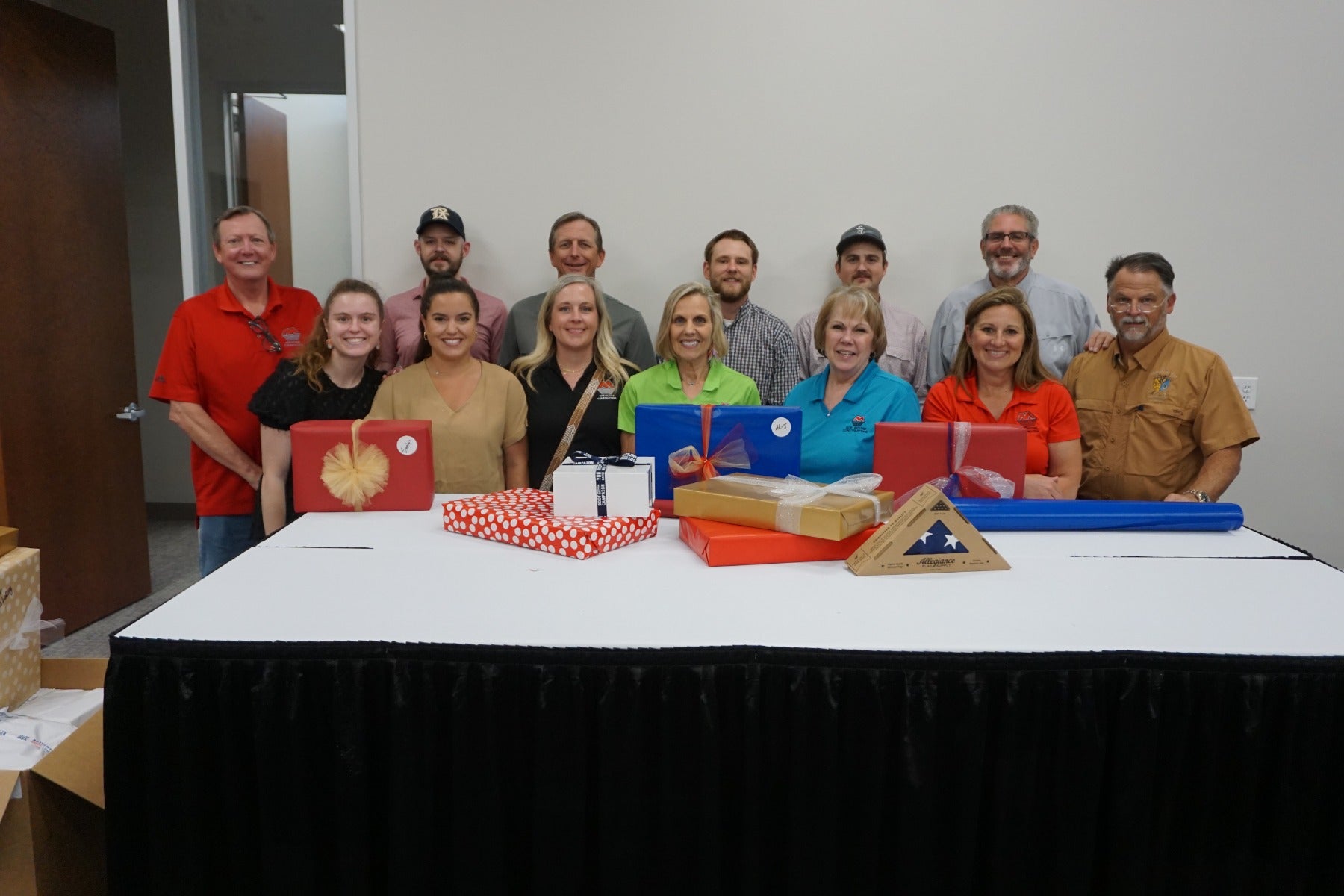 Service volunteers wrapping gifts