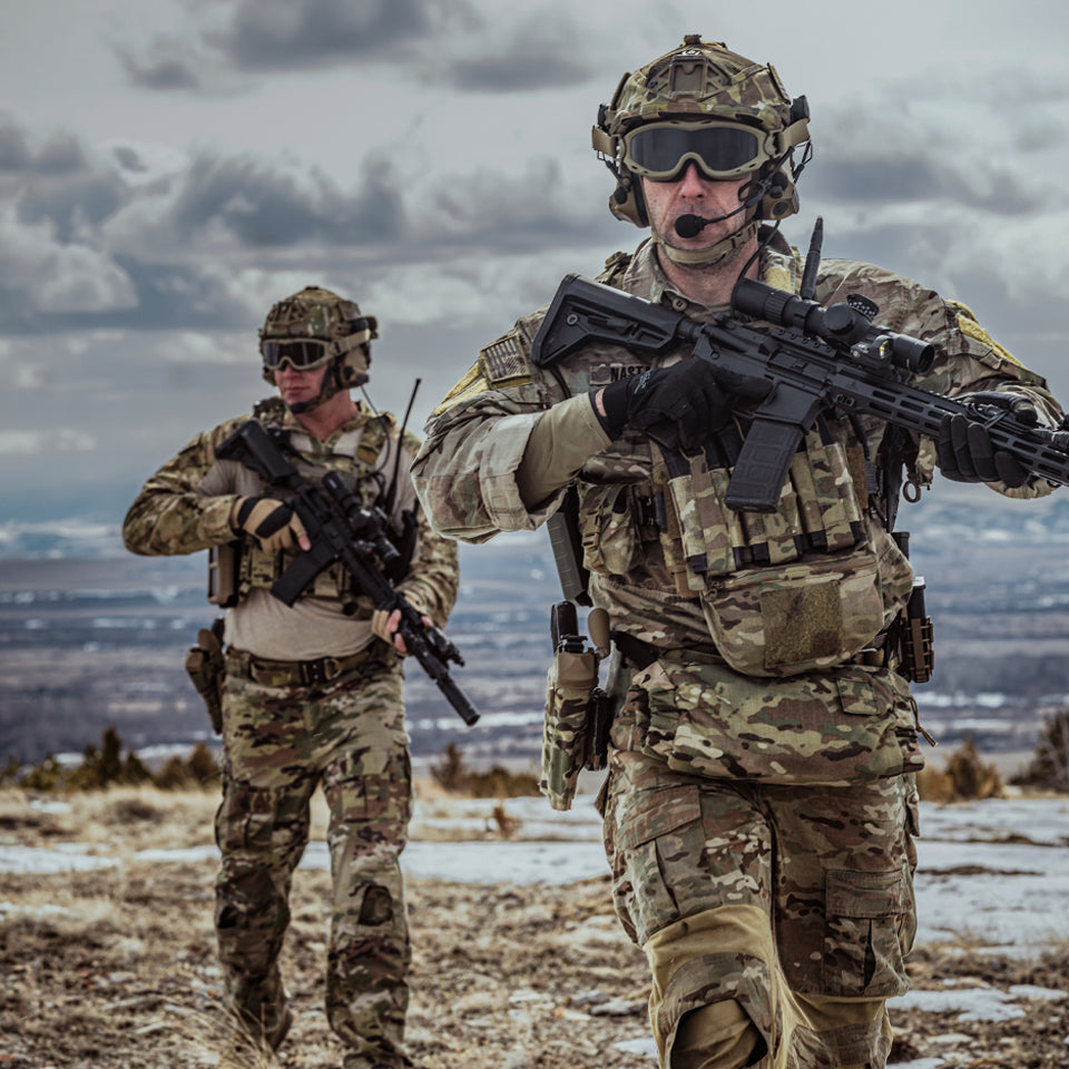 Soldiers walking thru the terrain