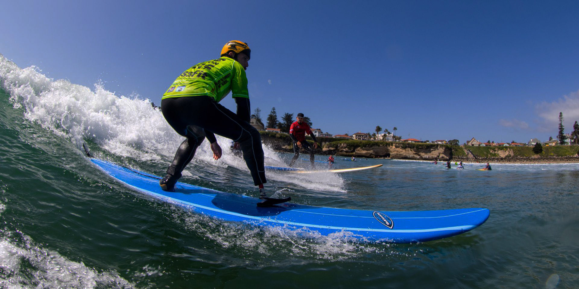 Operation Surf attendees catching a wave